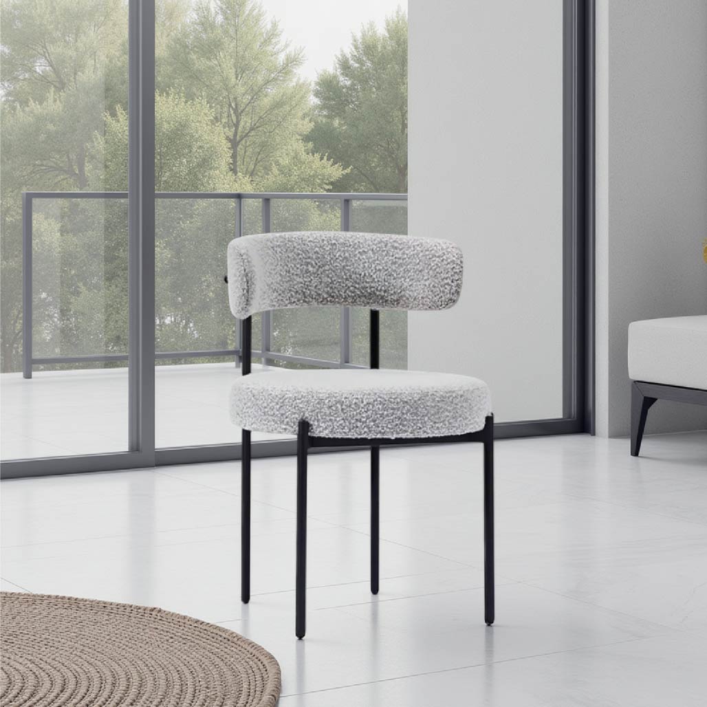 grey boucle steel curved dining chair