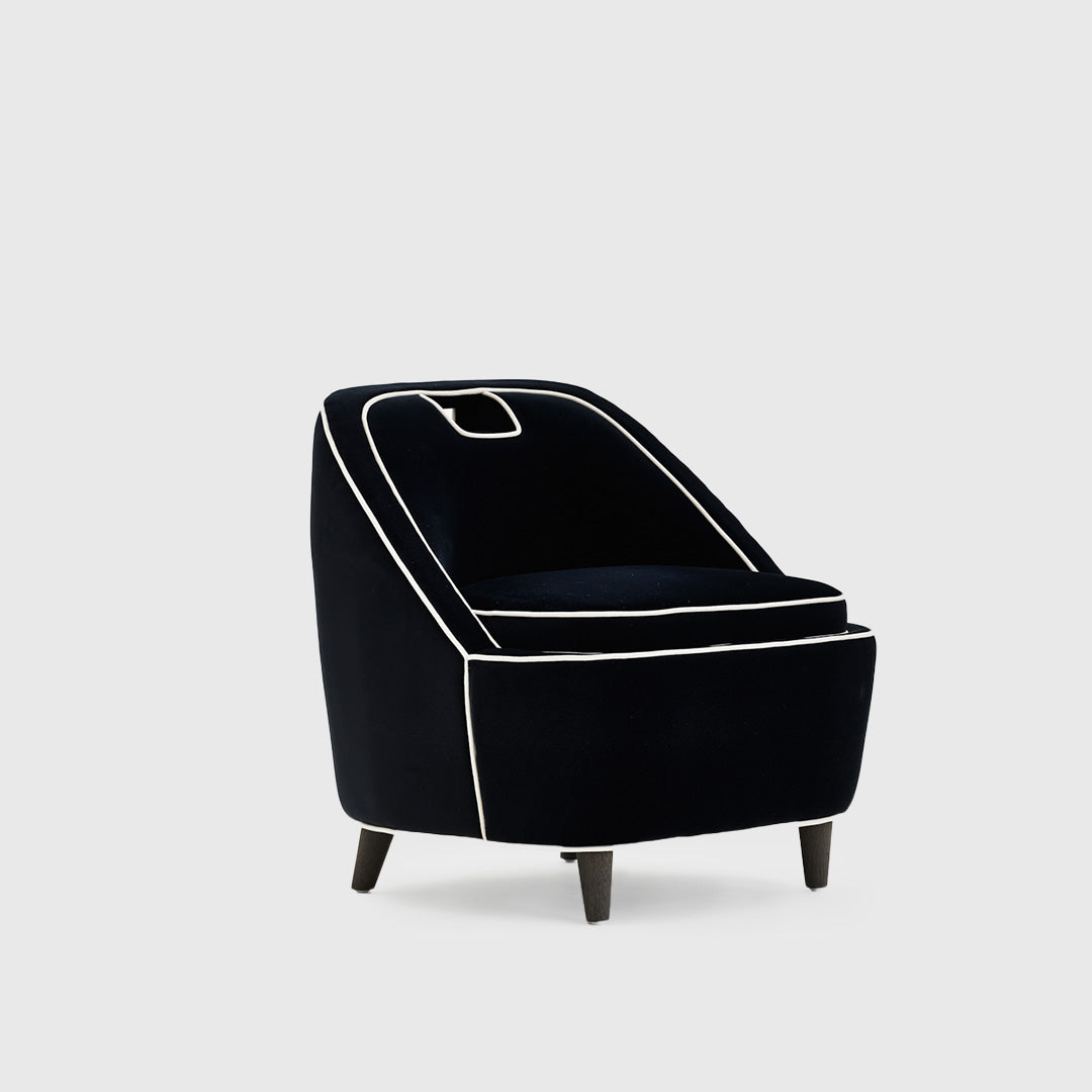 Black Accent Chair outlined with refined white piping